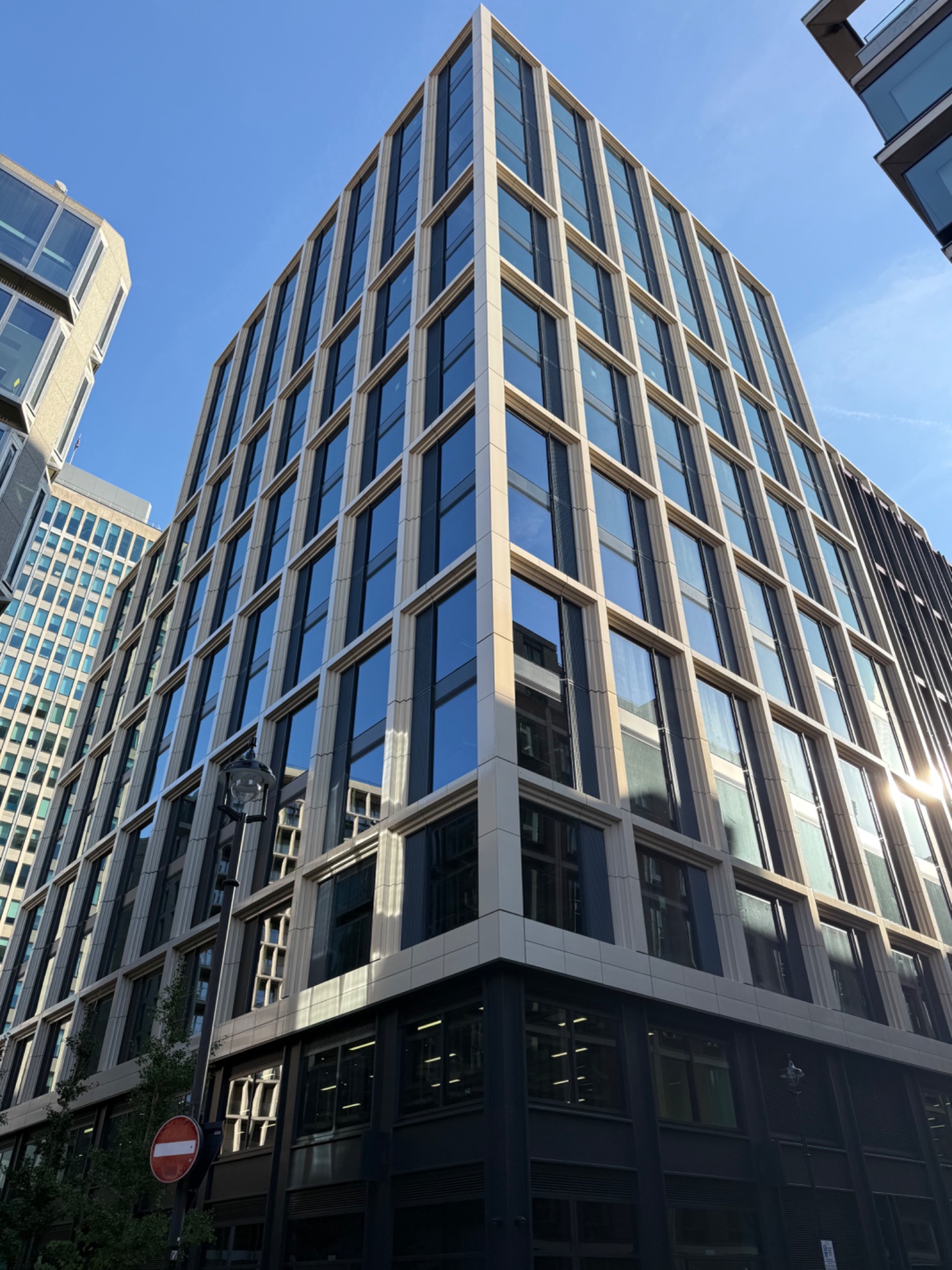 Completed commercial façade refurbishment viewed from street level